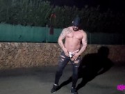 Thonged muscle man on a public street