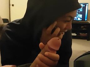 Cutie Talks On The Phone While Sucking Off His Dong