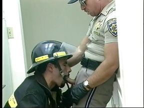 Gay fireman sucks a cock of a police officer