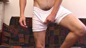 Stripped to boxer briefs, Chaz rubs vibrating dildo over growing bulge