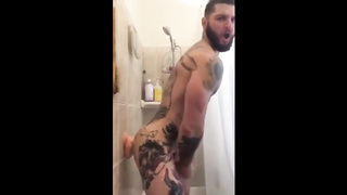 Tatted Hunk Fucks Dildo in Shower Until He Cums 6