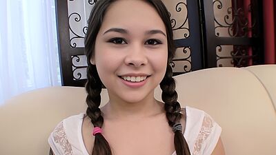 Pigtailed teen Kira Sinn eagerly taking cum facial