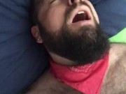 Big bearded and hairy bear wanking rubbing the bed sheet on his hard and wet cock. Beautiful Agony