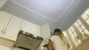 Hot Latina in a skirt and thong shows off big ass and shaved pussy while making coffee