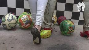 Soccer balls under metal heels 9