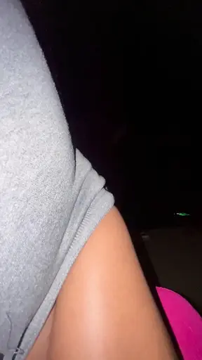 Black ebony babe rubs her pussy while watching a movie