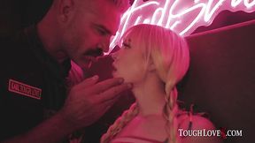 A petite blonde is having fun with a hard-working man.