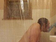 Sucking a bad dragon toy in the shower