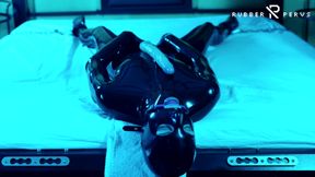 Tied Up Rubber Girl In Catsuit Fucking Herself
