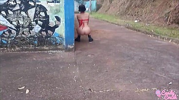 Teen peeing and sucking in public square