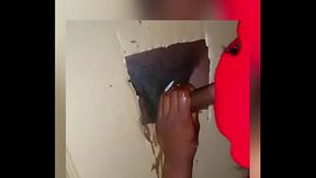 Sluttn out a Ts mouth through A glory hole