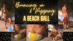 Bouncing on a beach ball in bikini and heels, before popping it and squeezing out the air