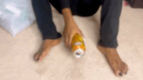 Big Barefoot Ebony Feet Crushing Plastic Bottles