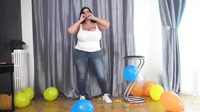 Sensual American woman Sofia Rose plays with colorful balloons and shows