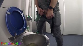 After peeing in the toilet on a moving train, I jerked off in front of the mirror. But before I could cum, I reached the final stop.