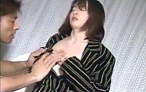 Japanese doll 7, a gorgeous lady with her pajamas got   in the chair