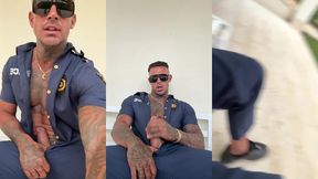a man in police officer cosplay jerks off