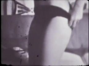 Strip-tease of a blonde woman in the sixties