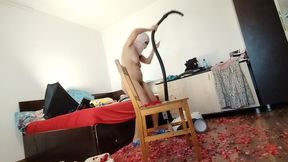 Amateur wife cleans the house with the vacuum cleaner. Sexy mom has fun with roses naked.