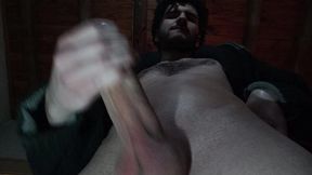 Hairy chested man jerks off his solid uncut cock