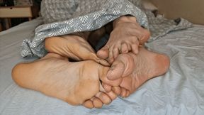 Rubbing and Intertwining Feet