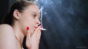 Topless Brunette Smoking in Dramatic Smoke