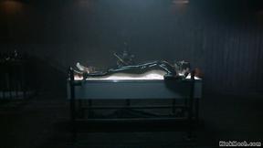 ”Bound ebony in latex beaver vibed”