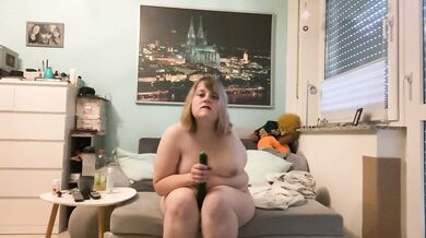 Amputee Girl plays with Cucumber