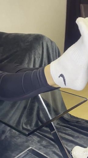 Dirty White Sneaker Worship - Smelly Socks in Face with Valeria Night (front View)