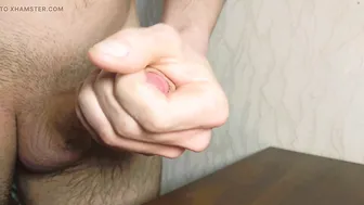 Alex Huff jerks his big uncut cock and shoots a massive cum load on the table