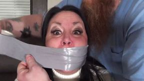 Gina Rae Michaels Chunk sweater and thick socks encased in pantyhose nylon over her face and then hooded