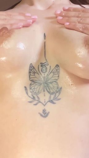 Big nipples in oil look even bigger   Clip 1