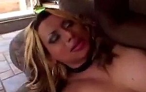 Busty tranny in high lates boots