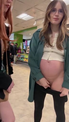 Pregnant woman in a store