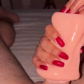 Deep red nails handjob with fake pussy