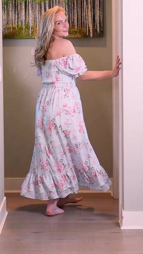 Hot babe in blue floral dress seductively struts her stuff
