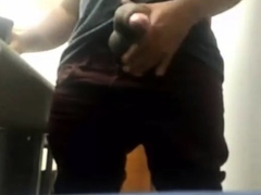 MILKING HIS BIG UNCUT BRAZILIAN DONKEY DICK AT WORK