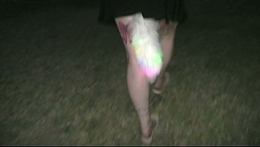 Very public walk with bright lights tail butt plug at the beach. We talk to passers by. Trailer