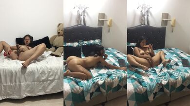 Horny lesbians masturbate their pussies while showing their tits.