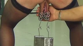 Mature Redhead MILF Endures Needles and Heavy Weights