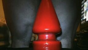 I can make that red butt plug disappear down my asshole