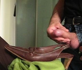 Cumshot into her shoes