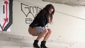 Long legged brunette college freak has public pissing fetish
