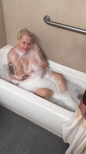 Naughty Bubbler Getting Soapy Masterbating in the Tub Her Pussy She Rubs