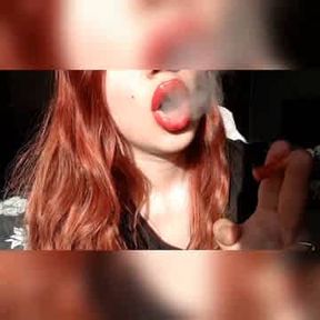 XO Bunny big red glossy lips sucking on cigarette