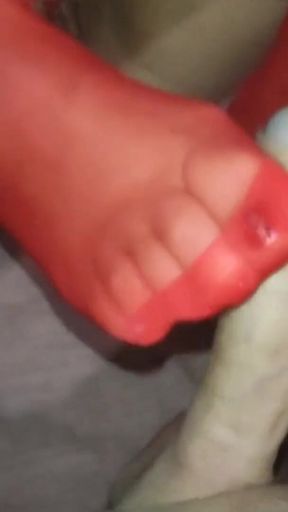Cum on the nylon soles of a hot MILF