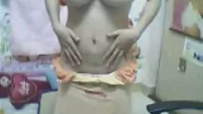 Bosomy brunette teen from Vietnam shows off her big titties