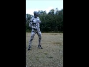 Spandex android jerking off inside spandex outdoors