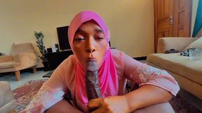 ebony qatar milf enjoying my dick while wearing her hijab