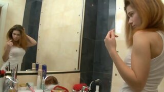 Sweet girl Kisa is playing with pussy in the bathroom